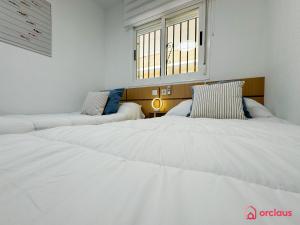 Postel nebo postele na pokoji v ubytování Mar de Azahar