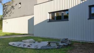 a building with a fire hydrant in the yard at Villa Lascaux in La Chapelle-Aubareil +13 photos