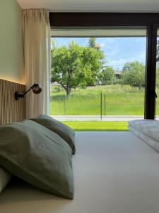 Postel nebo postele na pokoji v ubytování Apartment Malfi