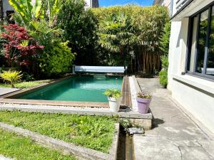 Πισίνα στο ή κοντά στο Villa Rosa65 - Piscine extérieure - Salle de sport - Sauna privé