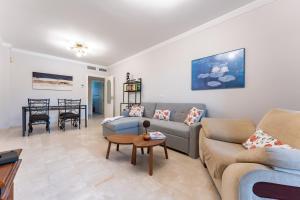 Posezení v ubytování Pino Golf Garden Apartment Elviria