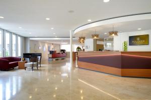 Lobbyn eller receptionsområdet på Hotel Boldern