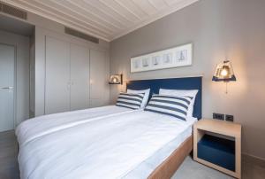 Posteľ alebo postele v izbe v ubytovaní Hapimag Resort Porto Heli