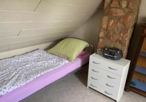 Voodi või voodid majutusasutuse Ferienwohnung Kaiser toas
