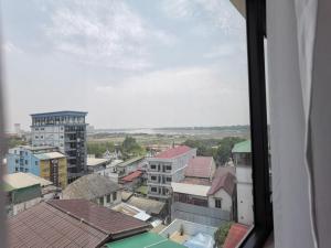 a view from a window of a city at Aaron Hotel in Vientiane