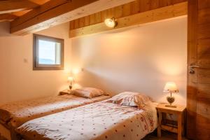เตียงในห้องที่ Chalet du Piedmont