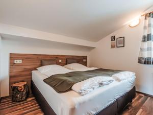 Postel nebo postele na pokoji v ubytování Apartment Hoamat by Interhome