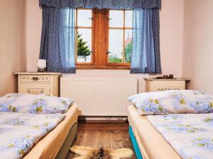 Postel nebo postele na pokoji v ubytování Holiday Home Na kopečku by Interhome