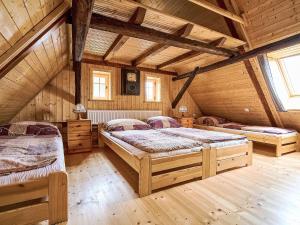 Postel nebo postele na pokoji v ubytování Holiday Home Jizerka by Interhome