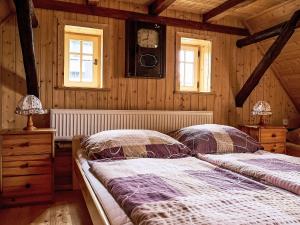 Postel nebo postele na pokoji v ubytování Holiday Home Jizerka by Interhome