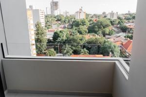 Un balcón o terraza de Excelente Depto en Las Lomas