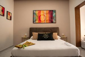 A bed or beds in a room at Maison S