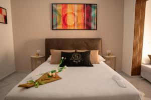 A bed or beds in a room at Maison S