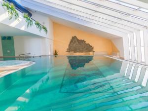 Πισίνα στο ή κοντά στο Moderne strandnahe Fewo inkl Pool, Sauna, Whirlpool & Strandkorb - 235