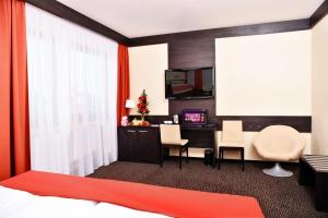TV a/nebo společenská místnost v ubytování Hotel Lifestyle