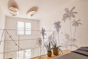 Fotografie z fotogalerie ubytování Chic Surf-Inspired Mezzanine Studio "Coco Palm" v destinaci Sal Rei