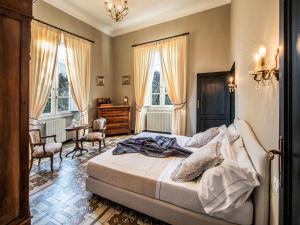 Ένα ή περισσότερα κρεβάτια σε δωμάτιο στο Villa Villa Belvedere - SGS135 by Interhome