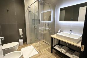 Koupelna v ubytování Hotel Delta Premium