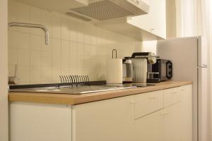 Dapur atau dapur kecil di Welc-ōM Padova Panta Rei rooms +46 gambar