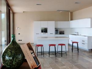 A kitchen or kitchenette at Holiday Home Le Palaie - 'Pizzeria' - PEC207 by Interhome