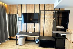 TV a/nebo společenská místnost v ubytování Hotel Delta Premium