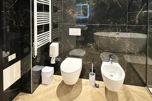 Koupelna v ubytování Hotel Delta Premium