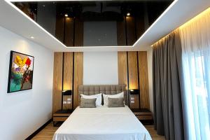 Postel nebo postele na pokoji v ubytování Hotel Delta Premium
