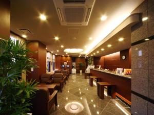 Posezení v ubytování Hotel Route-Inn Utsunomiya Miyukicho -Kokudou4gou-