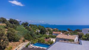 a villa with a view of the ocean at Villa Belenos Piscine vue mer in Saint-Peïre-sur-Mer
