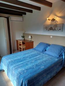 Postel nebo postele na pokoji v ubytování Le RENDEZ VOUS DE L'ETE