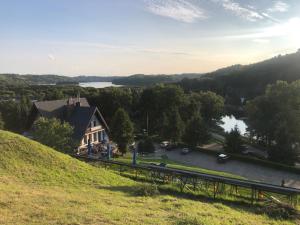 a house on a hill with a view of a lake at Stanica MODRAK - Najpiekniejszy ZAKĄTEK KASZUB in Ręboszewo +98 photos
