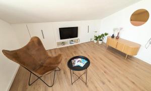 TV a/nebo společenská místnost v ubytování Apartments Tanya