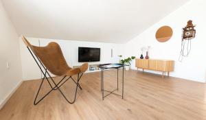 TV a/nebo společenská místnost v ubytování Apartments Tanya