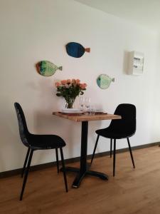 Posezení v ubytování Studio cosy et moderne + 12 fotografií