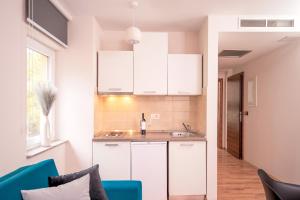 Кухня или мини-кухня в Hotel SOL
