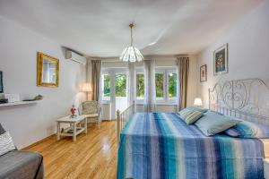 Posteľ alebo postele v izbe v ubytovaní Apartment Dragica