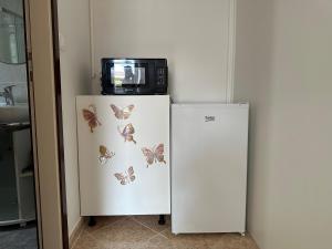 Kuchyň nebo kuchyňský kout v ubytování Rooms MARE