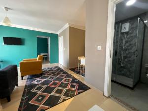 Postel nebo postele na pokoji v ubytování KHAN's B&B HOTEL