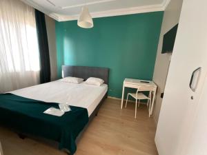 Postel nebo postele na pokoji v ubytování KHAN's B&B HOTEL
