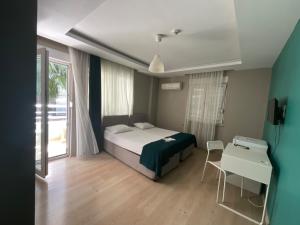 Postel nebo postele na pokoji v ubytování KHAN's B&B HOTEL