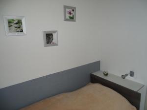 Ένα ή περισσότερα κρεβάτια σε δωμάτιο στο Ferienhaus in Hamm mit Offenem Kamin