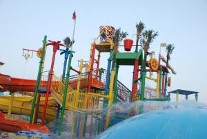 a water park with a bunch of water slides at Sea Club Resort in Dammam