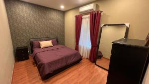 Postel nebo postele na pokoji v ubytování Parvatis Guesthouse