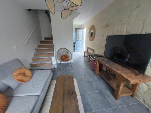 TV a/nebo společenská místnost v ubytování Mon Caillou