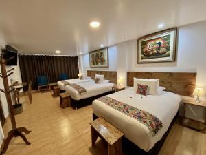 Voodi või voodid majutusasutuse Hotel Tara Machupicchu toas
