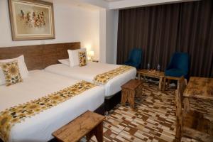 Voodi või voodid majutusasutuse Hotel Tara Machupicchu toas