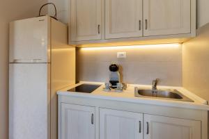 Køkken eller tekøkken på Dimora Soleda