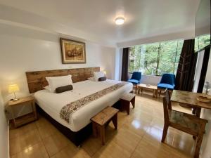 Voodi või voodid majutusasutuse Hotel Tara Machupicchu toas