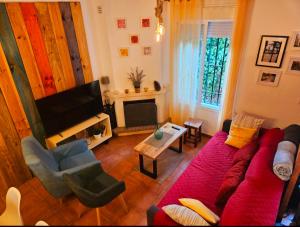 TV a/nebo společenská místnost v ubytování La Casa Junto al Sendero del Río & Piscina # aire acondicionado