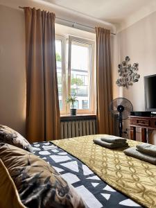 Posteľ alebo postele v izbe v ubytovaní Africa Apartment